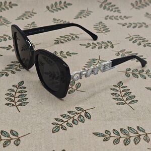 CHANEL Black Sunglasses with Silver Detailing
